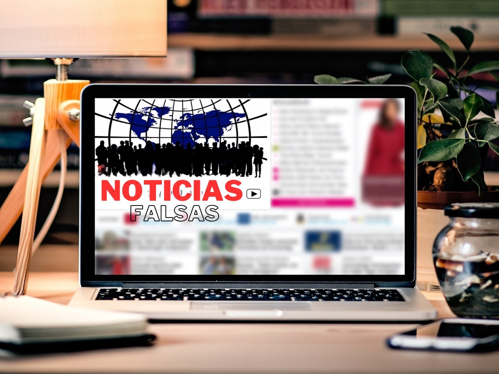 Imagen de una laptop con el título "noticias falsas"